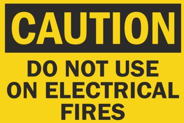 Unsafe vacuum cleaner with damaged cord smoke and electrical warning signs